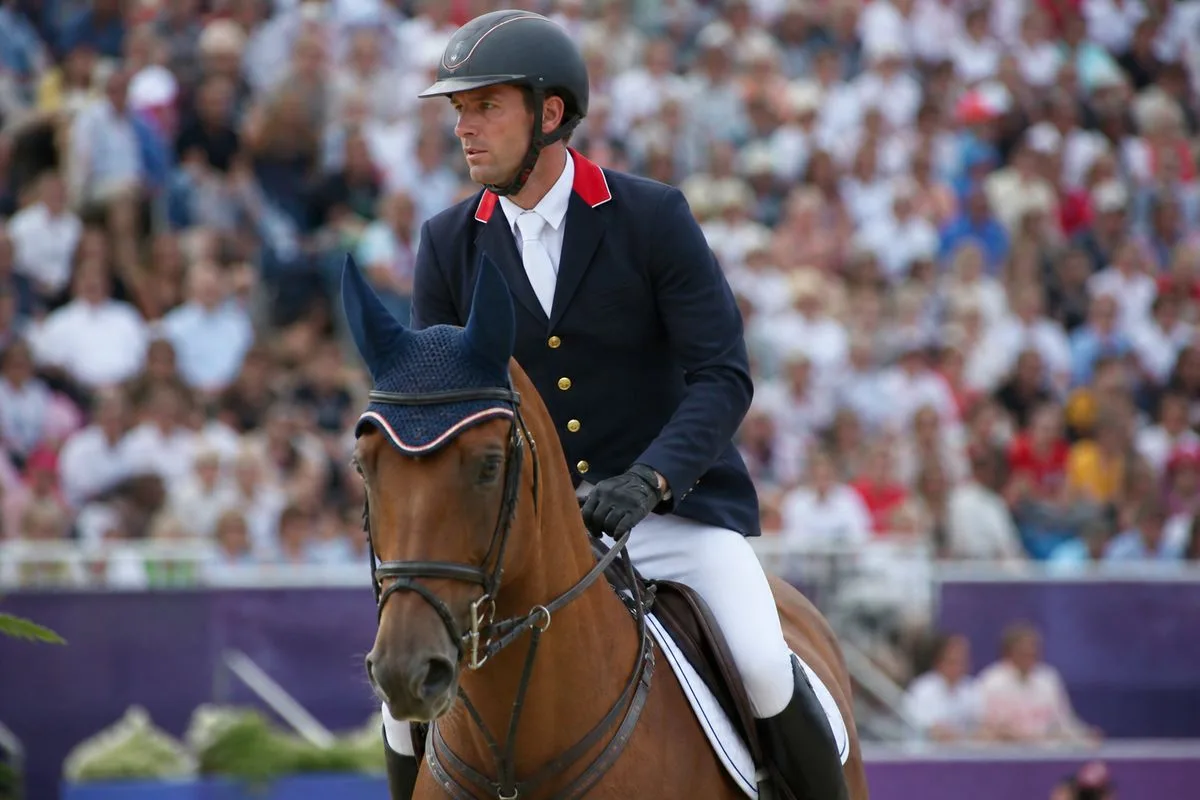 Scott Brash riding a horse during an Olympic showjumping event