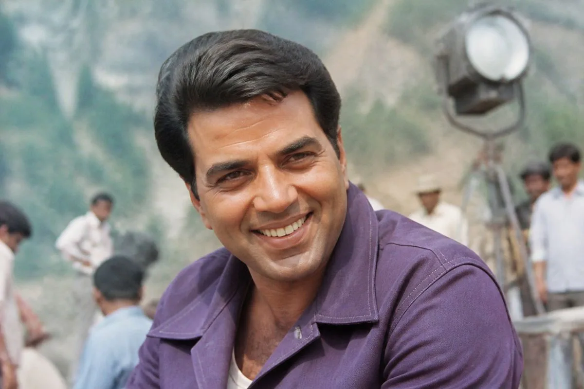 Dharmendra smiling on a 1970s film set.