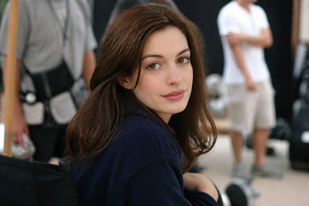 Anne Hathaway on a movie set between takes