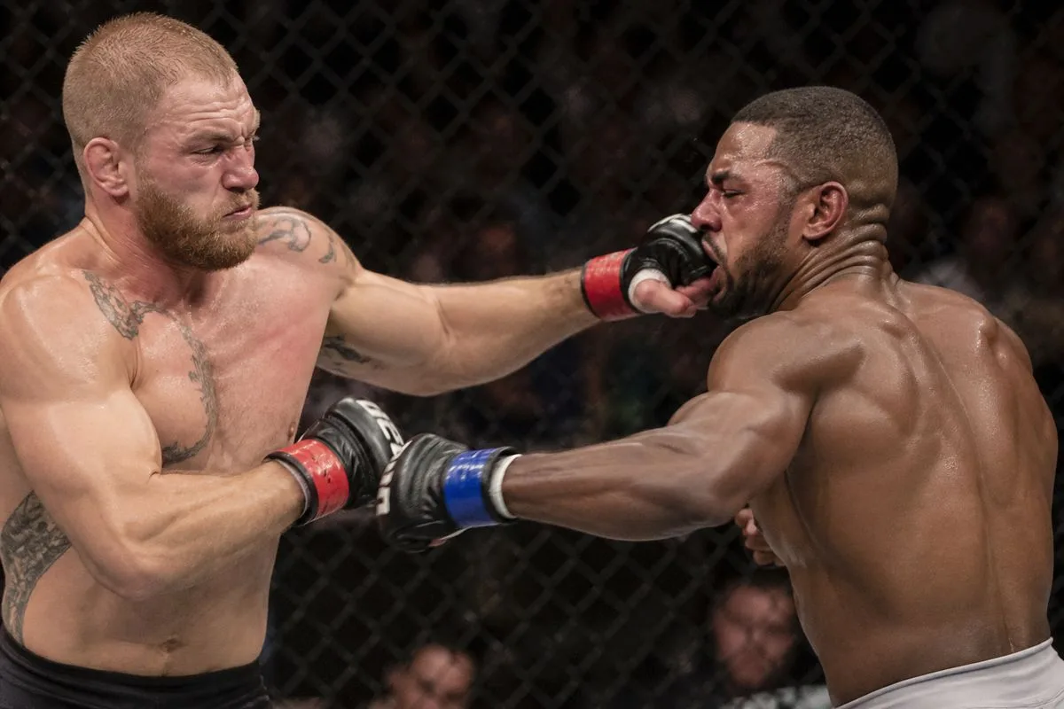 Two UFC fighters exchanging powerful punches in the octagon