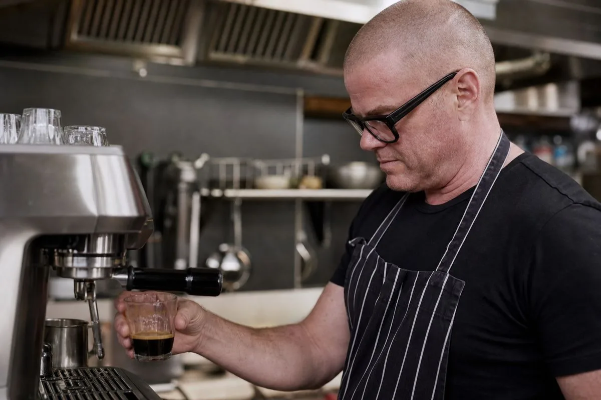 Heston Blumenthal testing a Sage espresso machine in kitchen