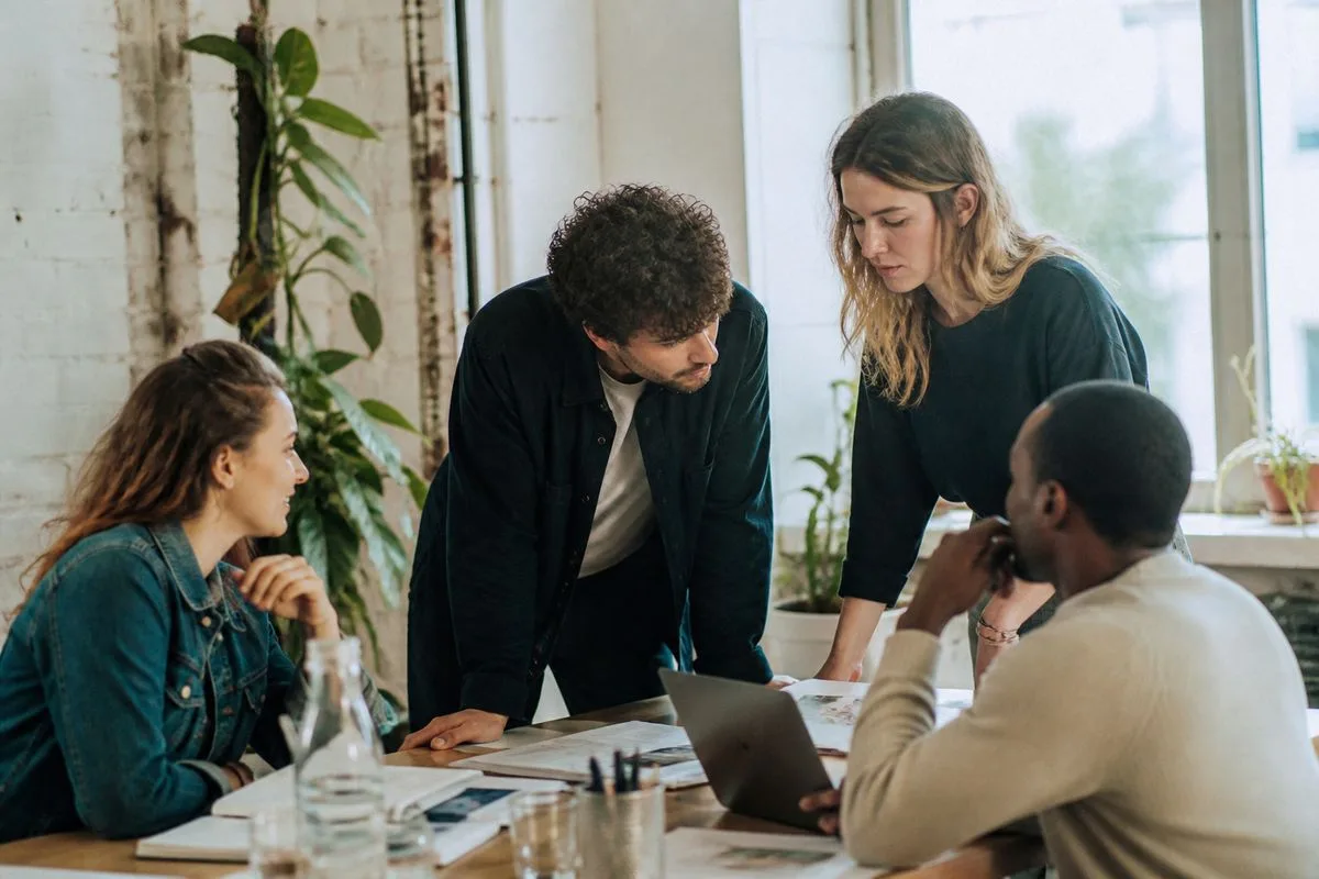 A startup team collaborating in a modern office space