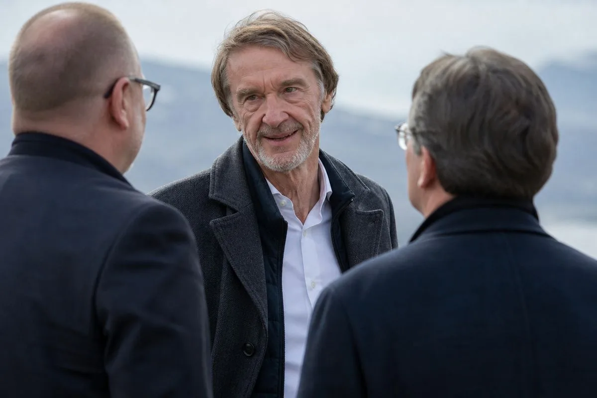Sir Jim Ratcliffe discussing Lausanne Sport with club officials outdoors
