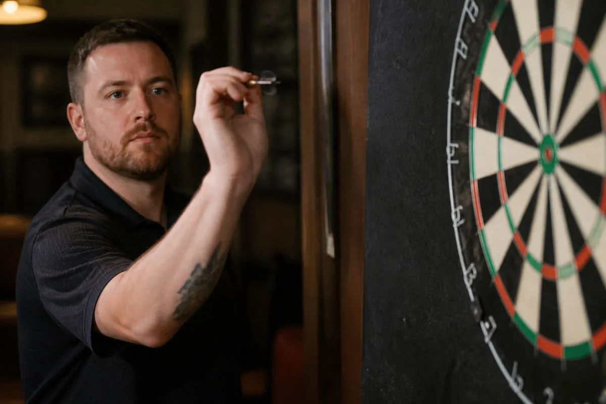 A darts player aiming at a double segment on the board