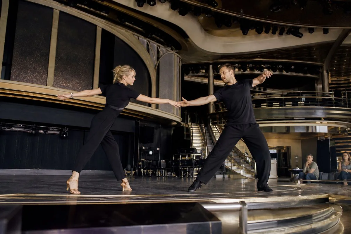 Strictly stars rehearsing on the Playhouse Theatre stage aboard a cruise ship