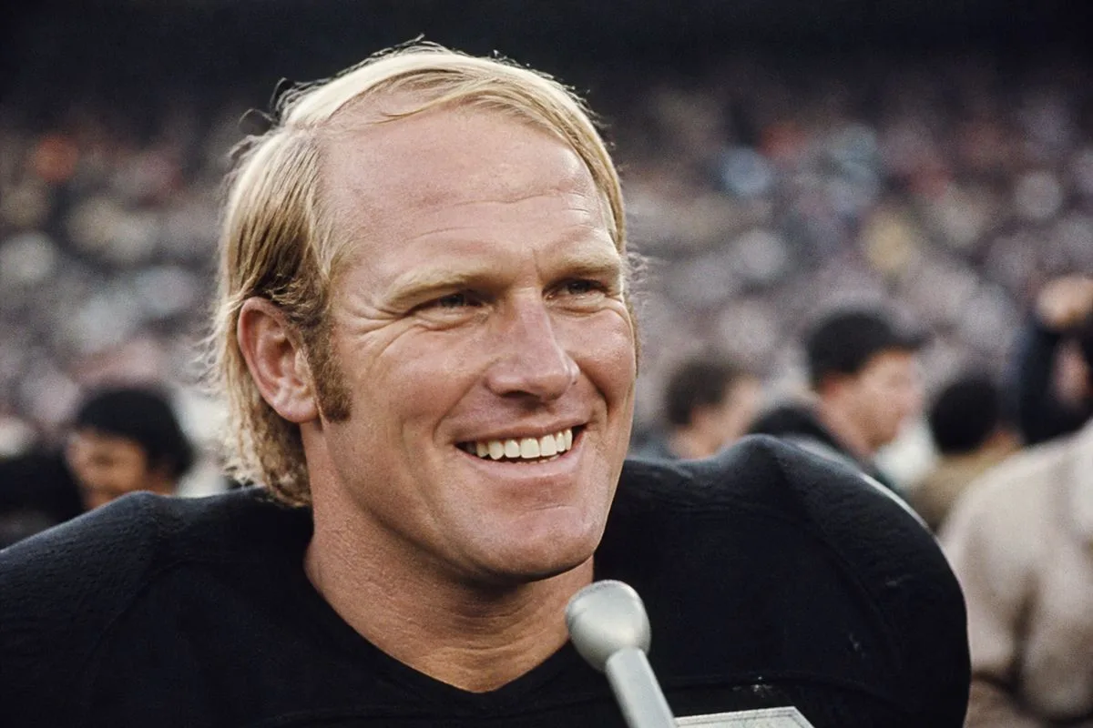 Terry Bradshaw smiling during a post-game interview