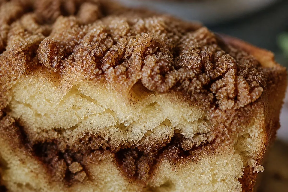 Close-up of cinnamon and brown sugar layer on coffee cake slice