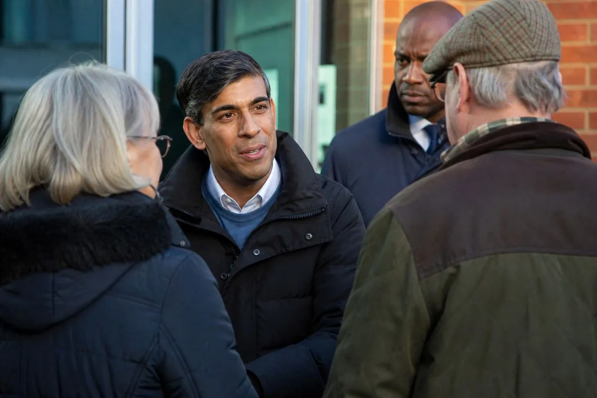 Rishi Sunak speaking with constituents outside a clinic