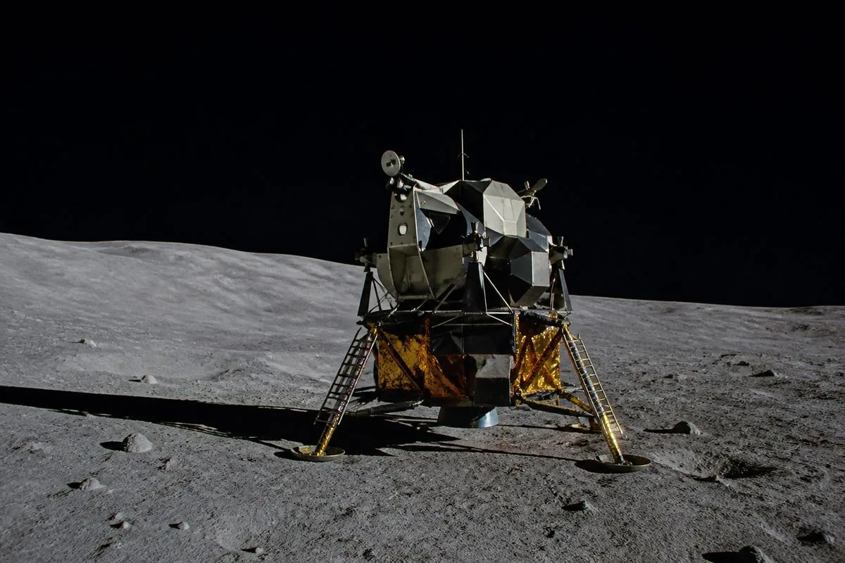 A small spacecraft resting on the Moon's far side surface