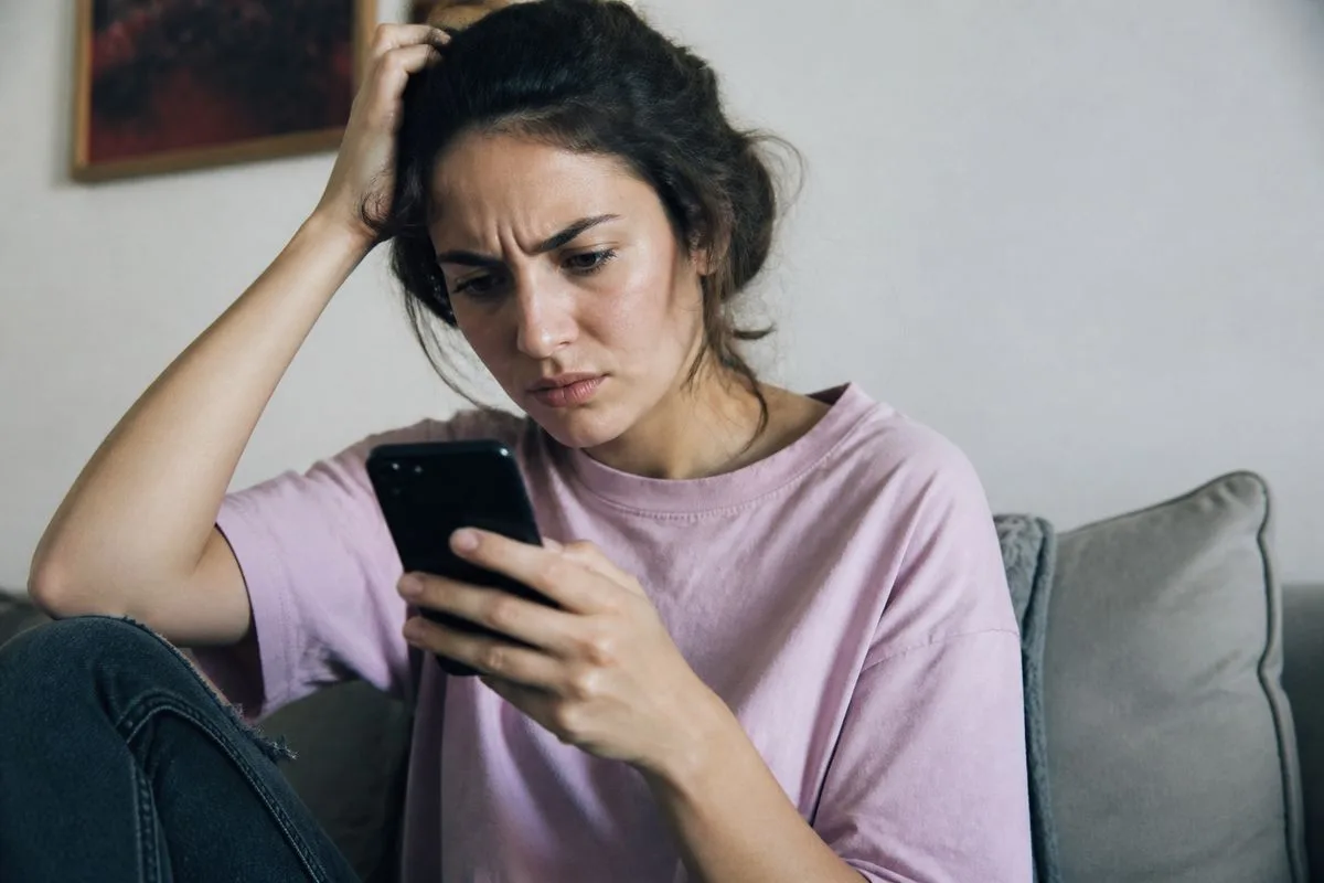 A frustrated shopper navigating a mobile e-commerce site