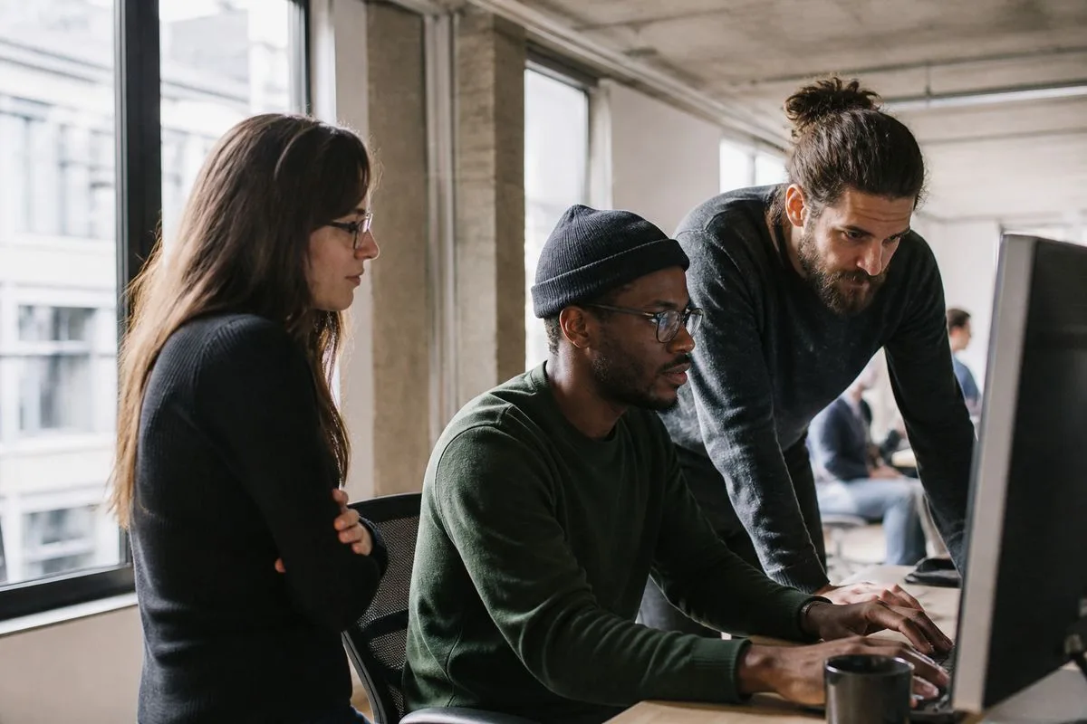 A team of developers collaborating in a modern office.
