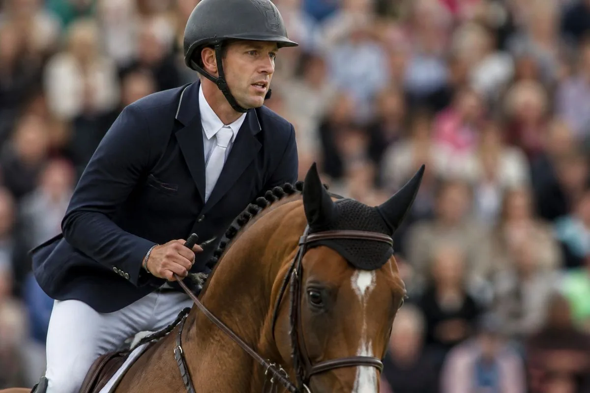 Scott Brash riding a horse during a tense competition moment