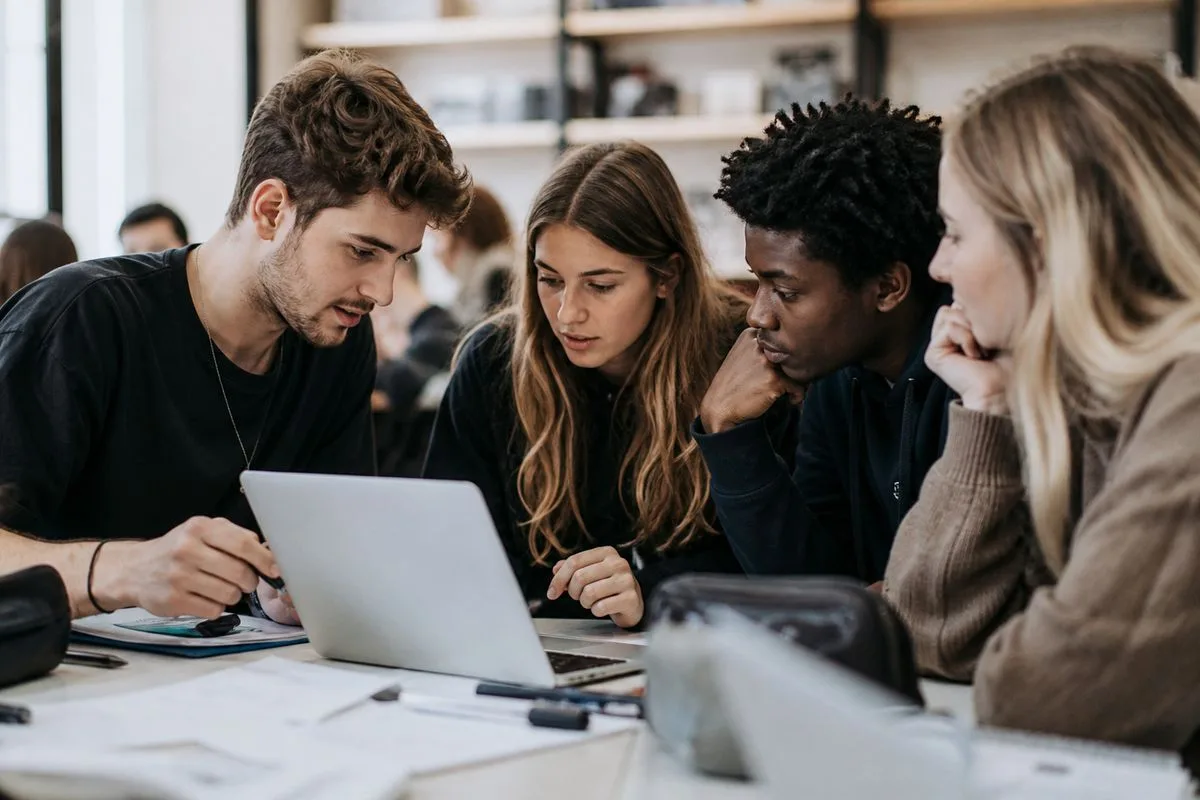 Students collaborating on a startup project in a classroom