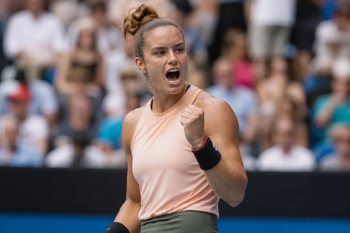 Maria Sakkari celebrating a powerful forehand winner on court