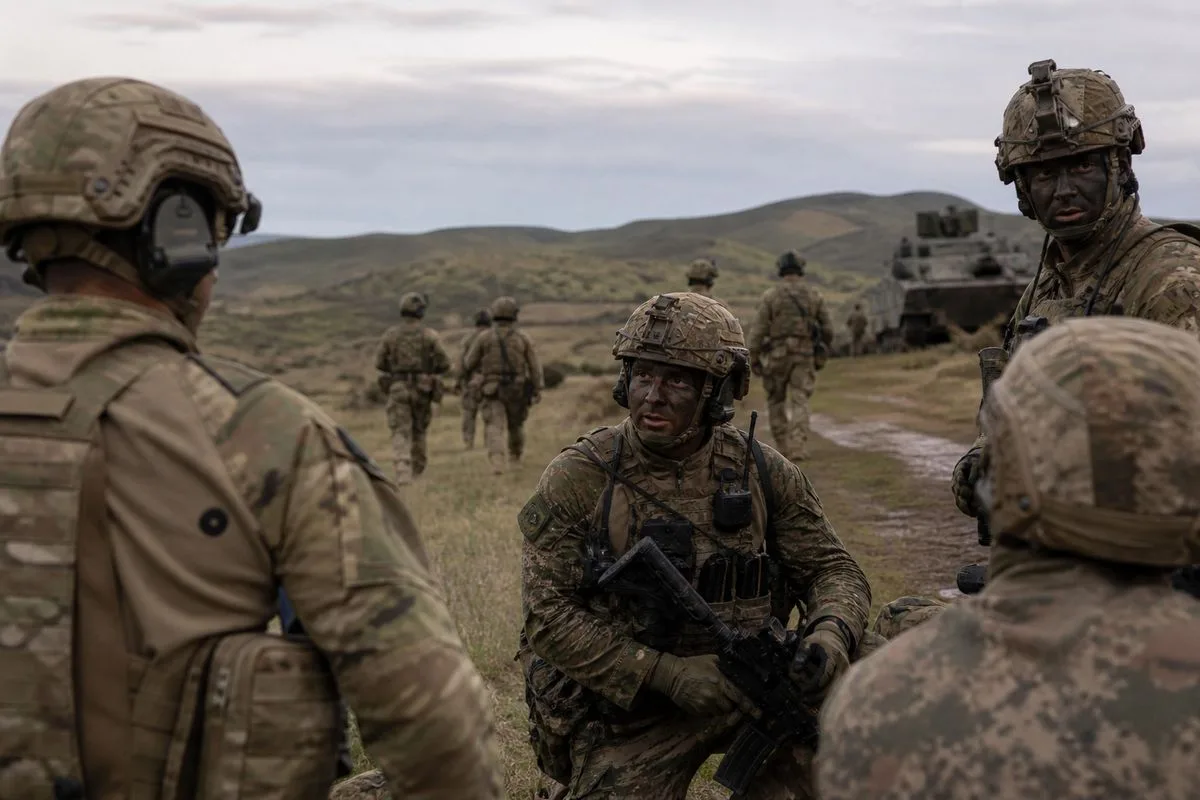 NATO soldiers conducting joint military exercises in the field