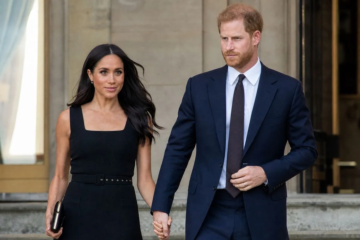 Prince Harry and Meghan leaving a royal residence together