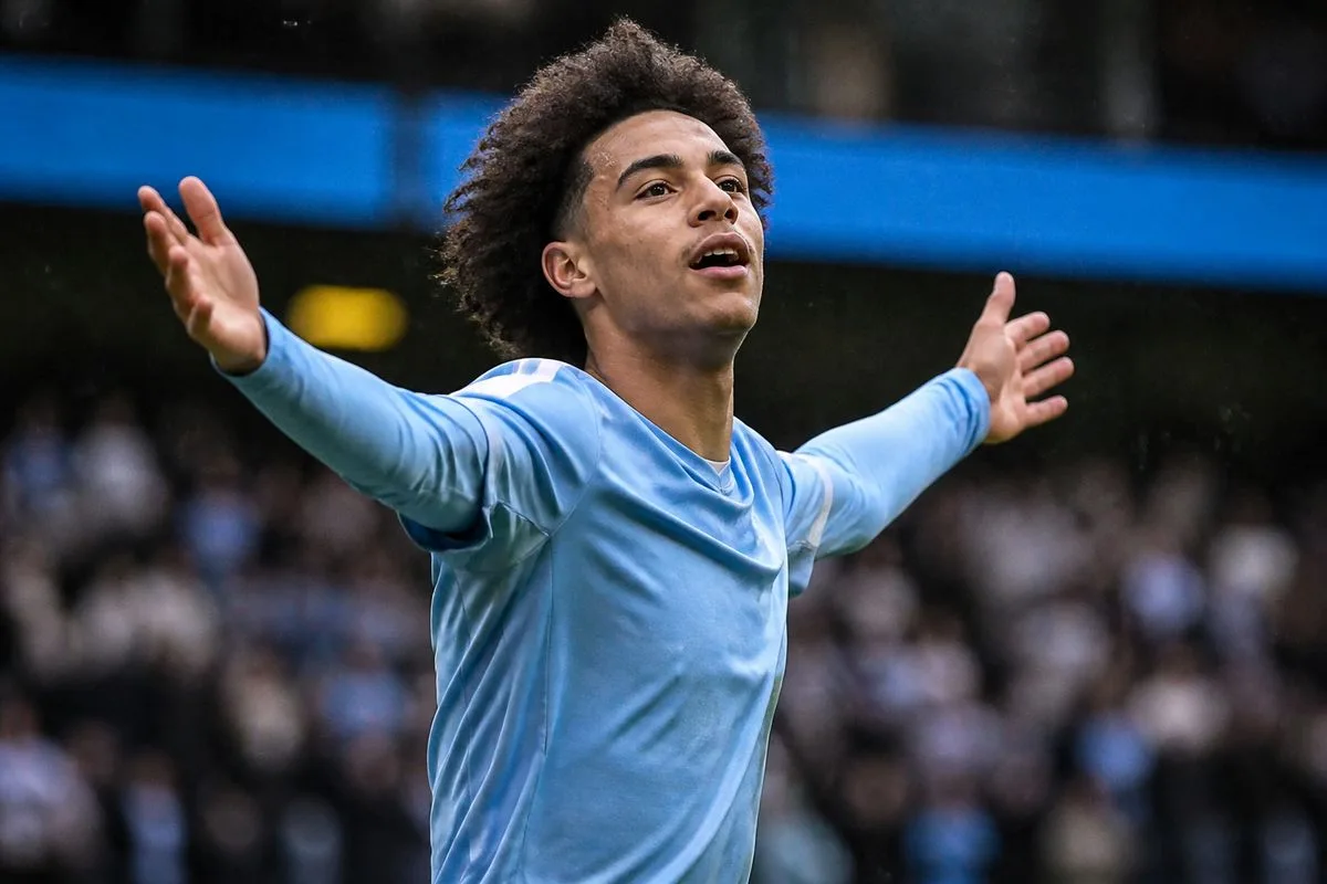 Bouaddi celebrating a goal in Manchester City jersey