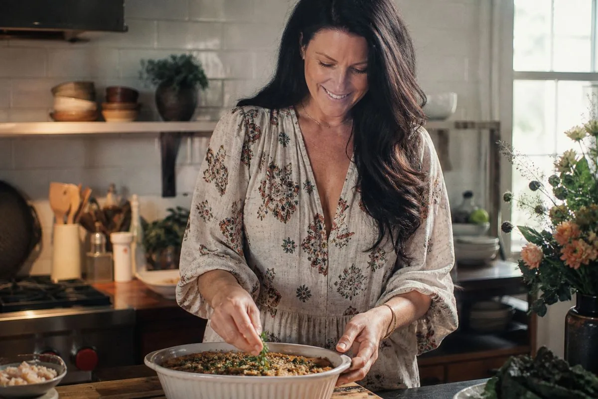 Nicole Hunn cooking gluten-free comfort food in her kitchen