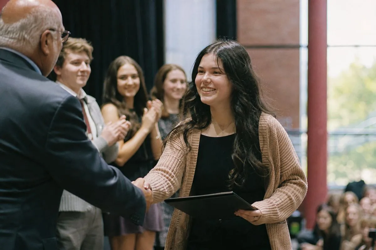 Students receiving awards at a career tech center ceremony