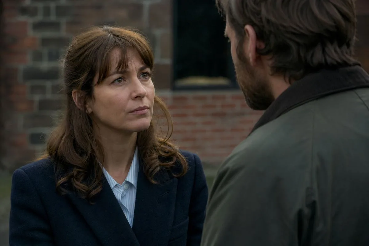 Actors filming a tense scene on a Netflix drama set