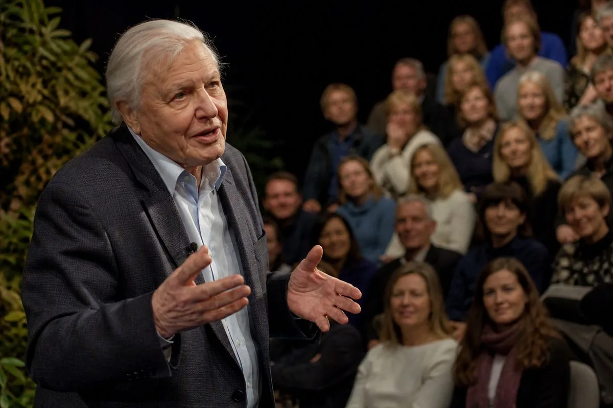David Attenborough speaking to a captivated studio audience
